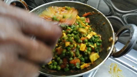 Making Mattar paneer Stock Footage 194496982
