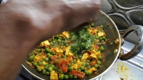 Making Mattar paneer Stock Footage 194496983