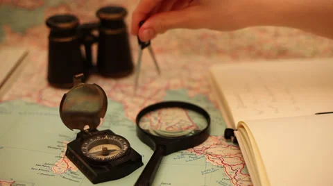 Making measurements on old map, writing in a notebook, measurements, geography Stock Footage 35924473
