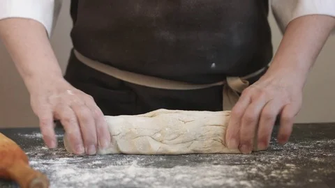 Making meat dumpling with wooden rolling pin. Stock Footage 74517422
