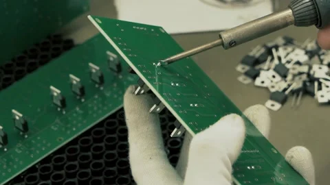Making a microcircuit by hand. Video stock 144611756