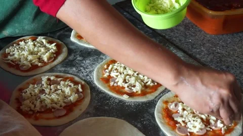 Making mini pizza Stock Footage 312865519