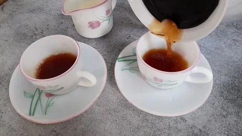 Making morning tea for a start to a good day Stock Footage 154198569