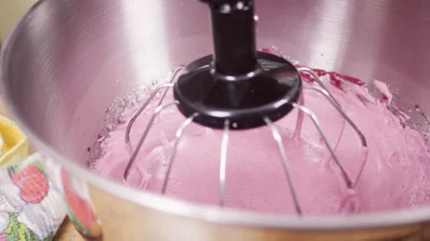 Making mousse dessert. Professional electric mixer whipping cream in steel Stock Footage 140104158