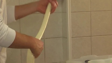 Making Mozzarella Cheese- Diary Cheese Factory Stock Footage 95768204