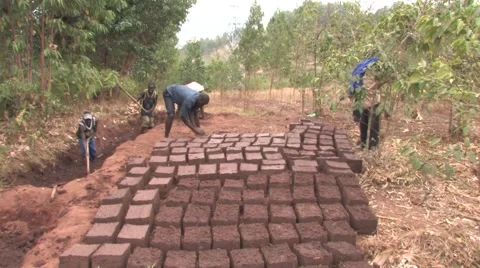 Making Mud Bricks in Rural African Village Stock Footage 51851665