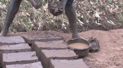 Making Mud Bricks in Rural African Village Stock Footage 51852519