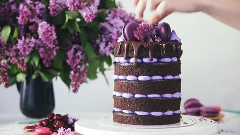 Making multi-layered wedding cake in spring style. Stock Footage 102042654