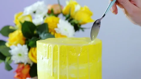 Making multi-layered wedding cake in spring style. Stock Footage 102932092