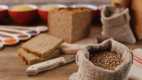 Making a multicereal and multigrain bread - healthy food concept Video stock 107853563