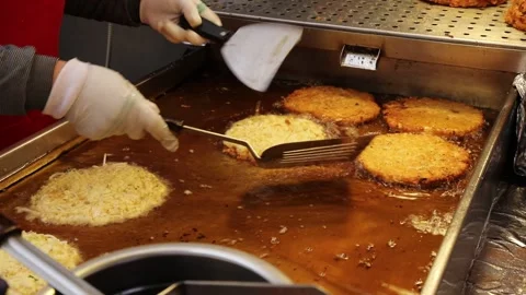 Making mung bean pancakes in Korea Stock Footage 283371189