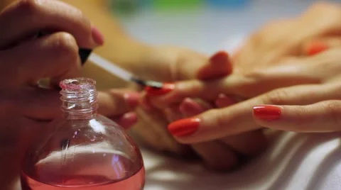 Making Nails Red Manicure Video stock 63602491