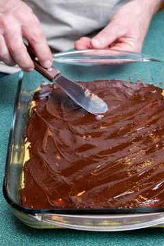 Making Nanaimo Bars in a Kitchen Stock Photos
