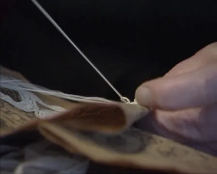 Making needlepoint lace, using a pattern - 03 extreme close up Stock Footage 25313700