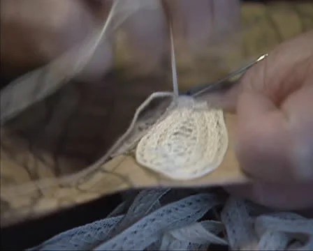 Making needlepoint lace, using a pattern - 05 extreme close up Stock Footage 25314437