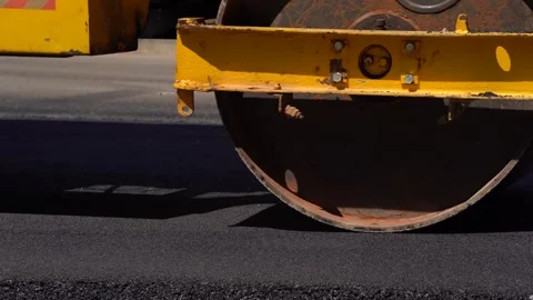 Making new asphalt at road construction. Roadway repair. Construction of new Stock Footage 270713167