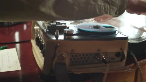 Making notes of crime evidence from old tape recorder, closeup shot Video stock 160116407