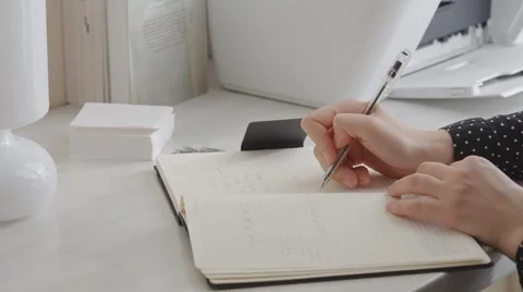 Making notes in the notebook Stock Footage 46512636