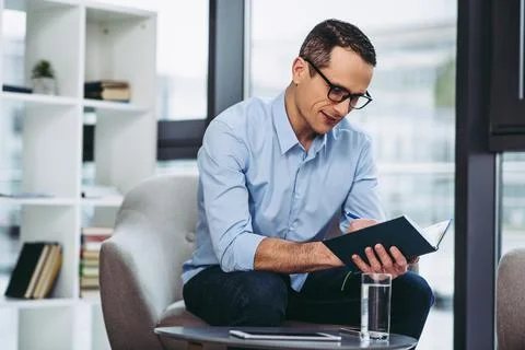 Making notes in notebook Stock Photos