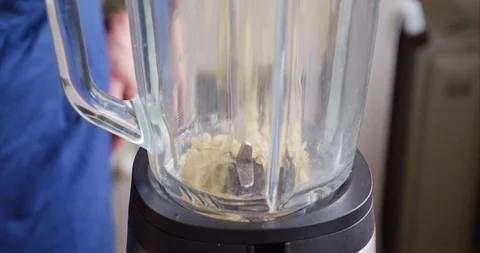 Making an oat milk smoothie Stock Footage 125126572