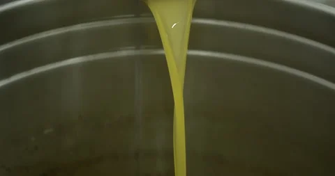 Making olive oil, coming out of final pi... | Stock Video | Pond5