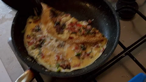 Making an omelette. Video stock 267238293