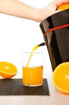 Making orange juice Stock Photos