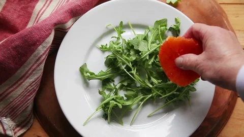 Making orange salad with avocado Stock Footage 104812262