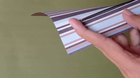 Making origami with a brown paper Stock Footage 150666388