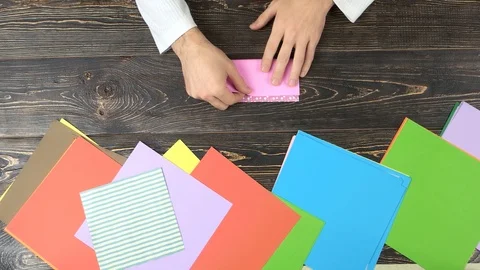 Making origami, top view. Video stock 93287037