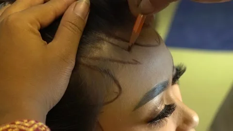 Making paes (head make up) on javanese wedding ceremony Stock Footage 143648479