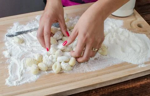 Making pasta gnocchi Stock Photos