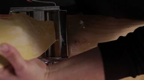 Making pasta in a pasta machine; top-shot, high-shot Stock Footage 64050608