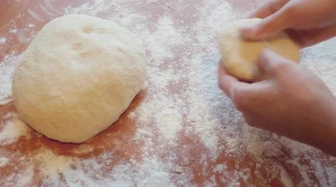 Making Pastry Dough for Cake. A baker rolling dough Stock Footage 49639045