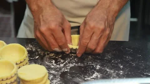Making Pastry Shell for Chinese Custard Egg Tart in Singapore Stock Footage 10727114