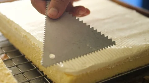Making Pattern On Vanilla Cake Stock Footage 92764997