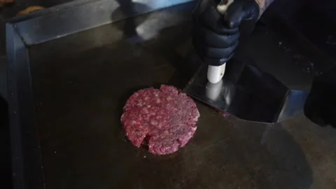 Making Patties On The Griddle Stock Footage 197056512