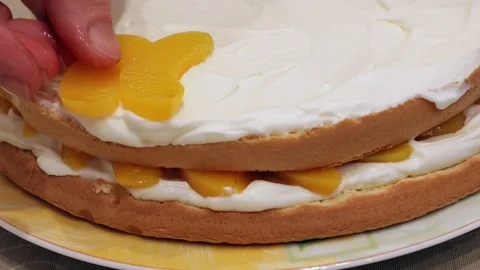 Making Peach Layer Cake Stock Footage 99579123