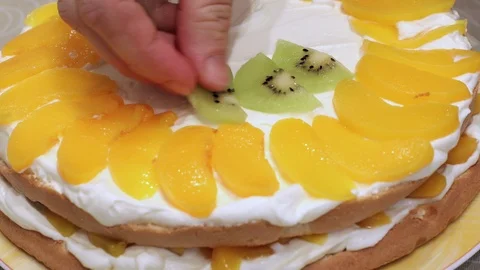 Making Peach Layer Cake. Stock Footage 99579572