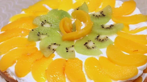 Making Peach Layer Cake Stock Footage 99579763