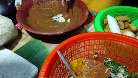 Making peanut sauce Stock Footage 242570461