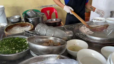 Making of Phnom Penh Kuy Teav Noodle Soup in Cambodia Stock Footage 253608171
