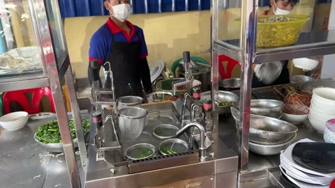 Making of Phnom Penh Kuy Teav Noodle Soup in Cambodia Stock Footage 253608361