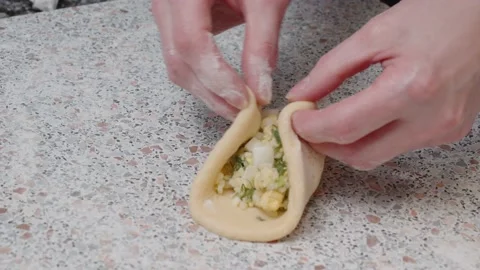 Making pie with green onions, boiled egg and rice. Stock Footage 166501772