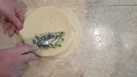 Making pies with cheese and herbs with your child. Stock Footage 123918284
