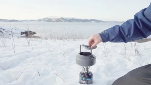 Making Pine Needle Tea -  Man Open The Lid Of Kettle With Boiling Water Stock Footage 169847302