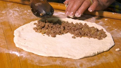 Making Pita with meat 1 Stock Footage 108010060