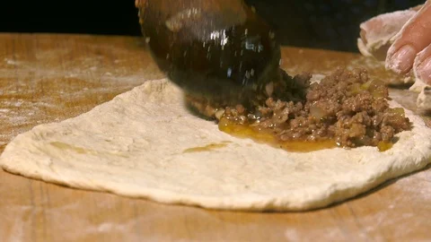 Making Pita with meat 2 Stock Footage 108010312