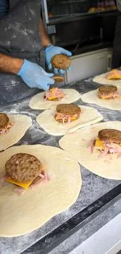 Making a Pizza Burger: The Cooking Process From Scratch Stock Photos