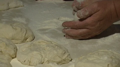 Making pizza or pide dough by close up male hands in pastry kitchen.  Stock Footage 90688182